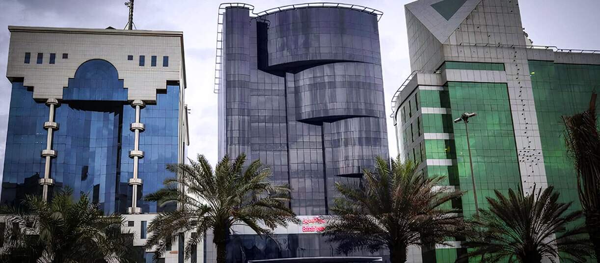 Bahrain World Trade Center twin sail-shaped office towers in Manama, Bahrain skyline landmark with integrated wind turbines